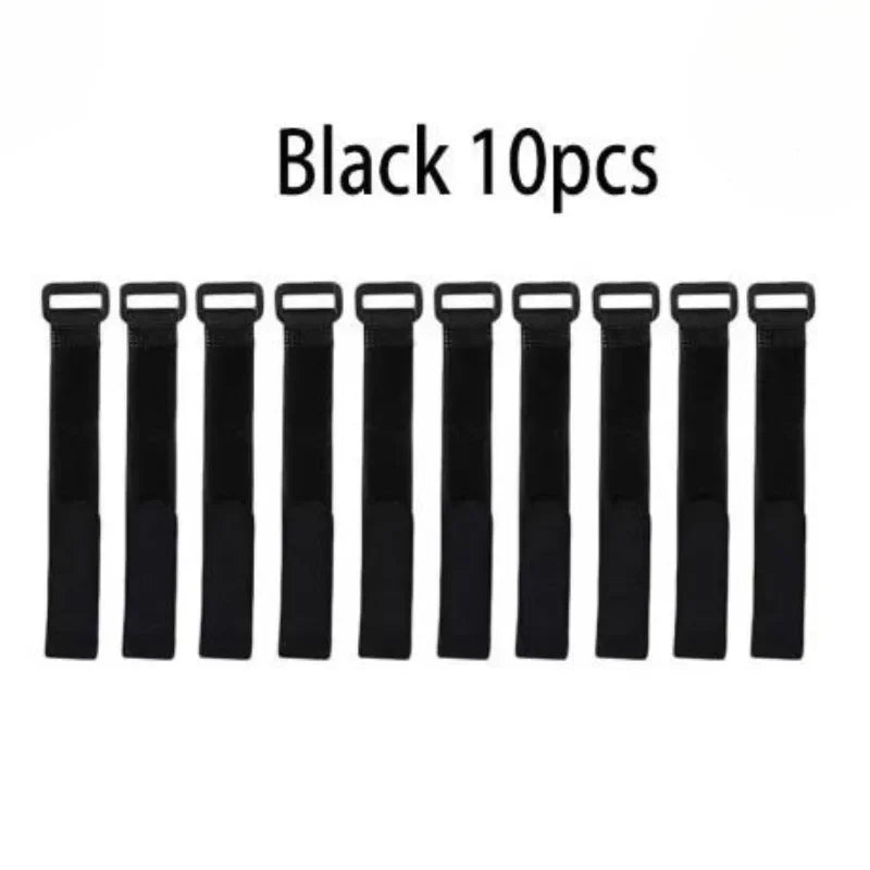 Чорні багаторазові ремінці для вудок, 10 штук, організовані в ряд.