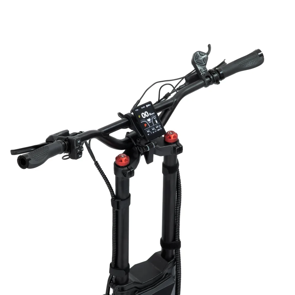 Close-up of the Kaabo Wolf King GTR Max cockpit — colour TFT display, twin brake levers, control switches and red fork preload adjusters