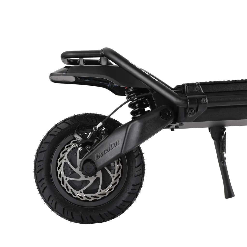 Close-up of the Kaabo Wolf King GTR Max rear wheel — hydraulic disc brake and rotor, off-road tyre and side kickstand